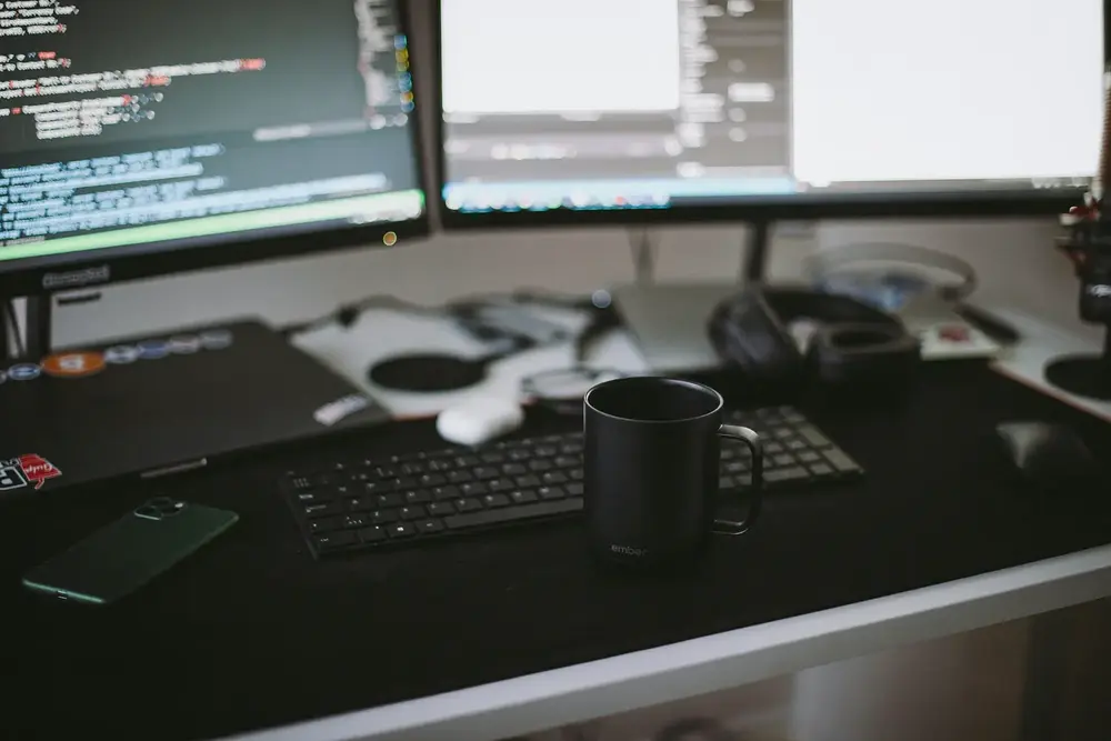 Desk setup with coffee for website development code